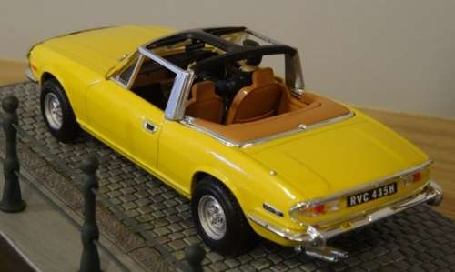 Triumph Stag 1976 JBond/007 dk. yellow 1/43 IXO NEW+boxed  #5159 instant wheels