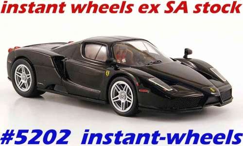 Ferrari Enzo 2002 black 1/43 IXO NEW+showcased FREE Delivery #5202 instant wheels
