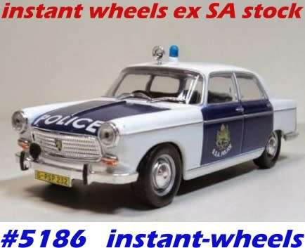 Peugeot 404 1965 BritishSouthAfricaPolice 1/43 IX0 NEWinBlister  #5186 instant wheels