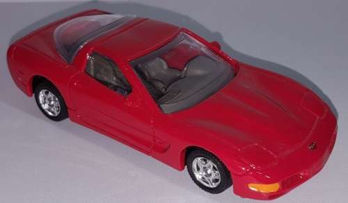 Chevrolet Corvette C5 Coupe 1997 red 1:43 Bburago NEW+boxed  #5313 instant wheels