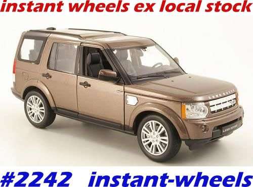 Land Rover Discovery 4 2010 lt.brown-met 1/24 Welly NEW+boxed FREE Delivery #2242 instant wheels