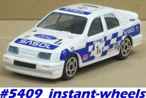 Ford Sierra RS Cosworth 1A Sasol Rally 90ties 1/43 Bburago NEW+showcased #5409 instant wheels