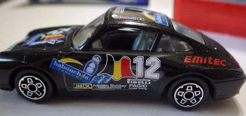 Porsche 911 Carrera 4RS #12 1975 black 1/43 Bburago NEW+reblistered  #5676 instant wheels