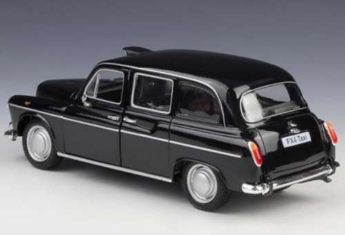 Austin FX4 London Taxi Cab 1958 black 1/43 Welly NEW+reblistered  #5736 instant wheels