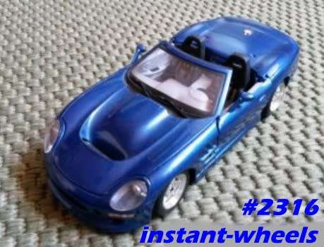 Shelby Series 1 1999 blue-met 1/24 Bburago NEW+reblistered  #2316 instant wheels
