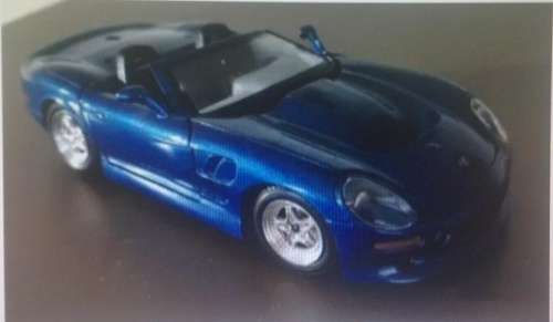 Shelby Series 1 1999 blue-met 1/24 Bburago NEW+reblistered  #2316 instant wheels