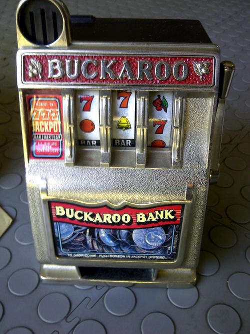 An Awesome Buckaroo Slot Machine Money Bank in it's box! Just to cool!!