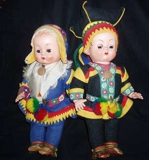 A OLD  BOY AND GIRL DUTCH DOLL IN TRADITIONAL CLOTHING