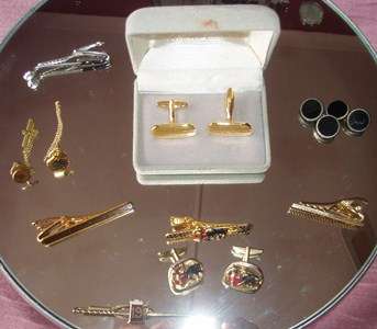 A NICE LOT OF CUFF LINKS AND TIE PINS
