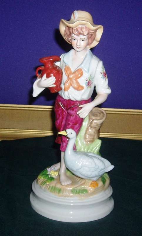 BEAUTIFUL   PORCELAIN BOY FIGURINE