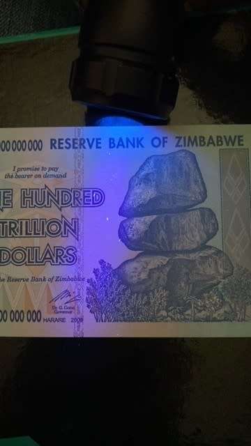 $100 Trillion Dollar Zimbabwe Bank Notes. Uncirculated condition
