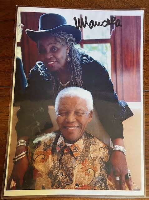 Nelson Mandela & Miriam Makeba laminated photo copy, signed by President Nelson Mandela (with COA)
