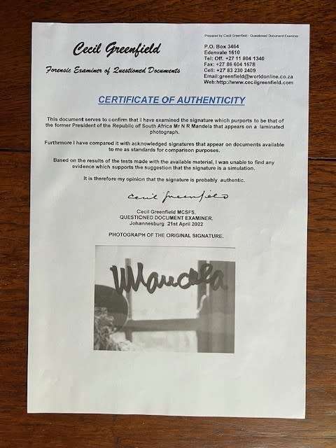 Nelson Mandela & Miriam Makeba laminated photo copy, signed by President Nelson Mandela (with COA)
