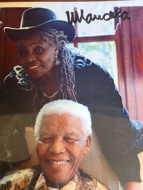 Nelson Mandela & Miriam Makeba laminated photo copy, signed by President Nelson Mandela (with COA)