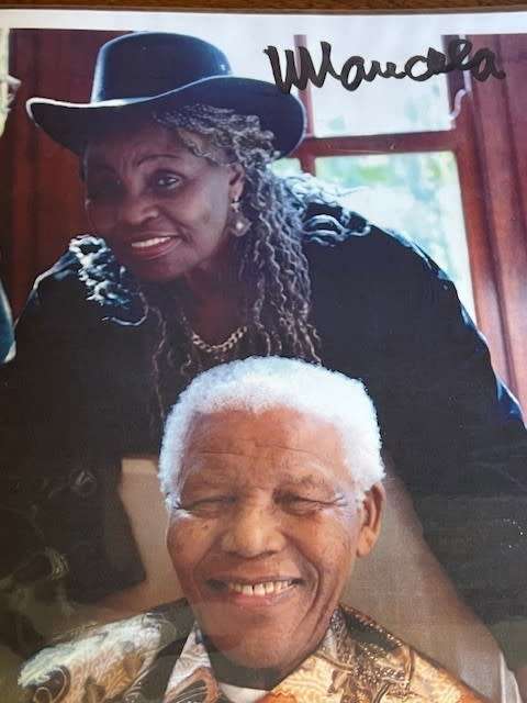 Nelson Mandela & Miriam Makeba laminated photo copy, signed by President Nelson Mandela (with COA)