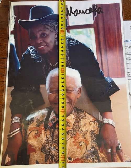 Nelson Mandela & Miriam Makeba laminated photo copy, signed by President Nelson Mandela (with COA)