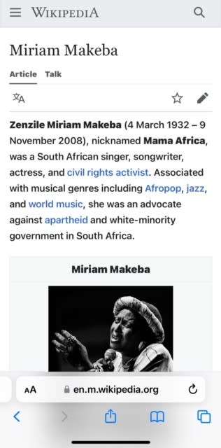 Nelson Mandela & Miriam Makeba laminated photo copy, signed by President Nelson Mandela (with COA)