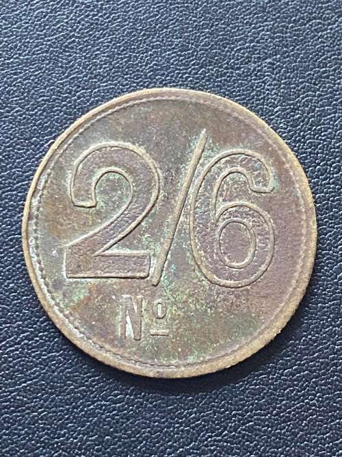 Unissued// Stamped O. G. & Co (Osborne, Garrett & Co) 2/6 Barber Shop Token