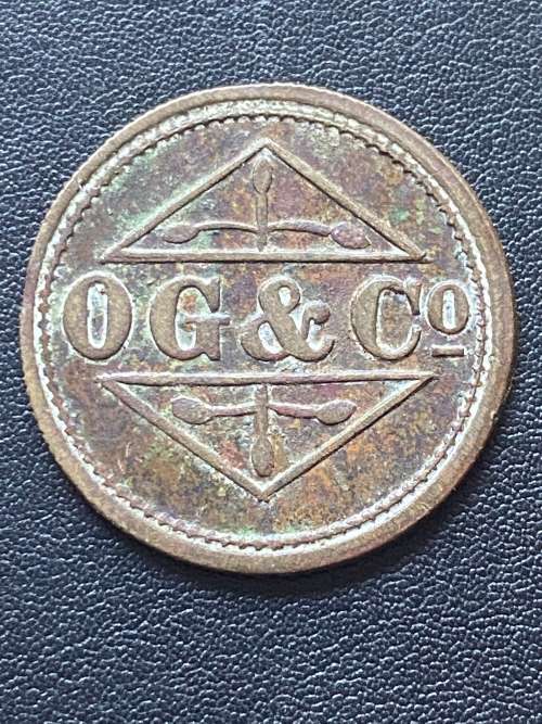 Unissued// Stamped O. G. & Co (Osborne, Garrett & Co) 2/6 Barber Shop Token