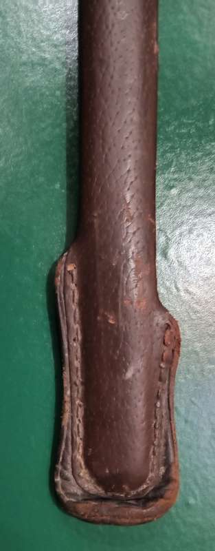 Sword with leather belt