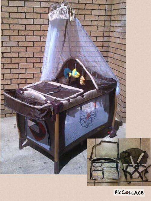 Camp cot with nappy bag and baby carrier included