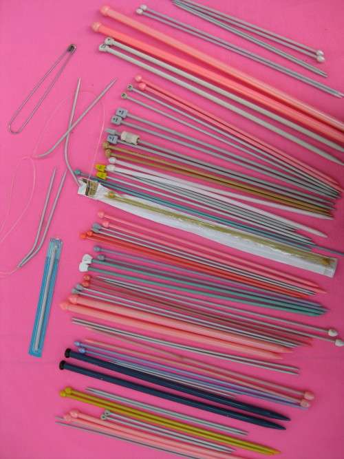Knitting needles.