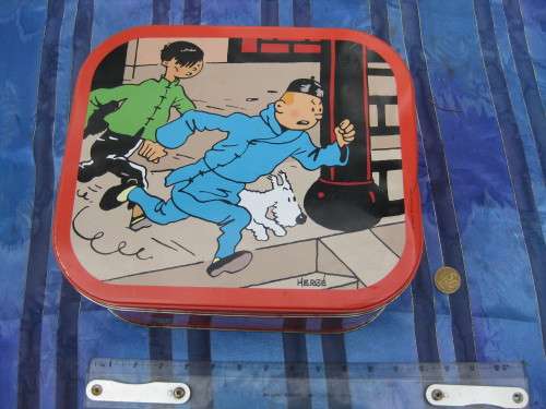 Herge Tin tin storage tin.  Some rust spot inside.  09-2011.