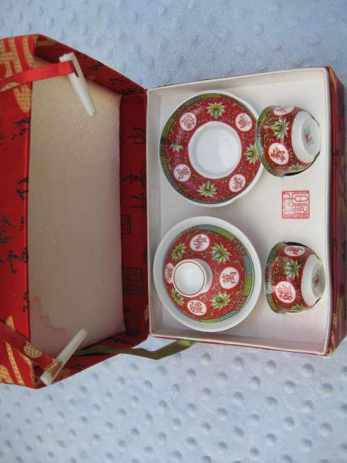 Oriental teacup, bowl and saucer set in box
