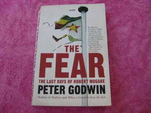 "The Fear Robert Mugabe and the Martyrdom of Zimbabwe"  Soft cover.  Peter Godwin.