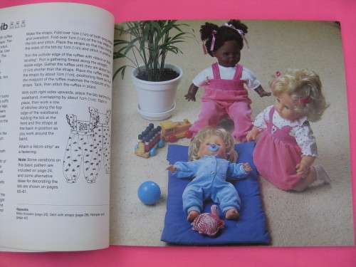 "Doll's Clothes"  Soft cover.  Create over 75 styles for your doll.  Mette Jorgensen.