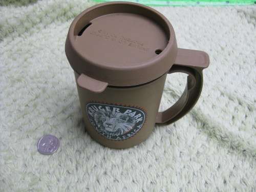 Kruger National Park plastic mug with lid.