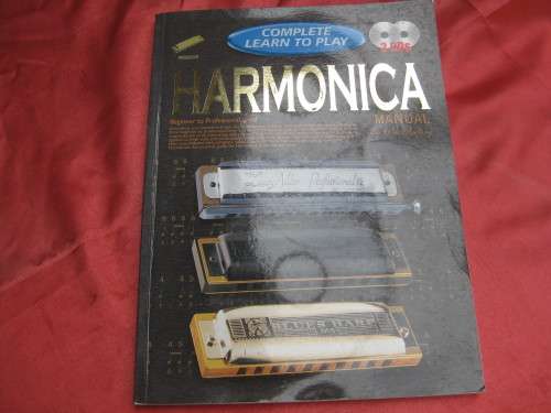 `Complete learn to play Harmonica Manual`  Soft cover.  2 CD`s.