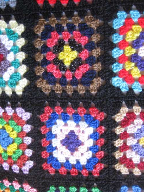 Granny blanket.  Hand-made crochet.  Double bed sized.  New.    L.