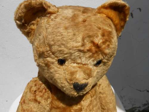 Retro, large (700mm high), straw-filled teddy bear with a small modern friend.