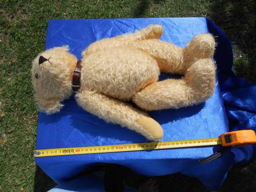 Retro, large (700mm high), straw-filled teddy bear with a small modern friend.