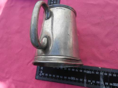 Pewter mug.