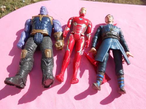 12` Action Figures.  Second-hand  (B)