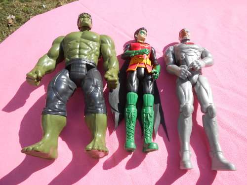 12` Action Figures.  Second-hand  (C)