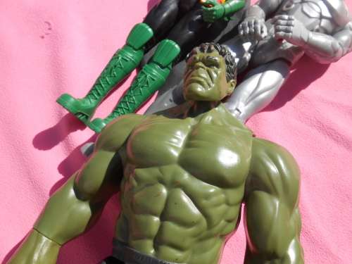 12` Action Figures.  Second-hand  (C)