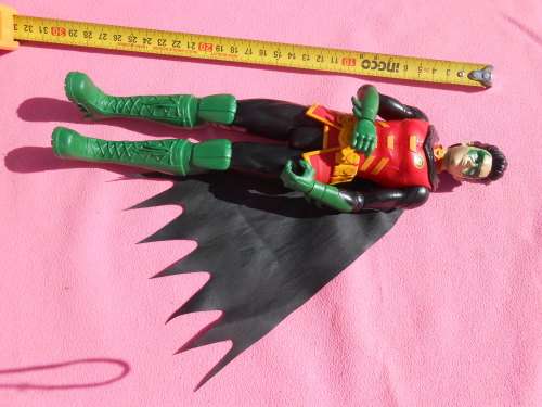 12` Action Figures.  Second-hand  (C)