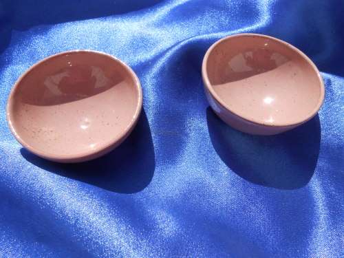 Very small, ceramic, sugar bowl, milk jug, 2 cups and saucers, 2 bowls and one cake plate.