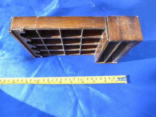 Doll`s house furniture or thimble display rack.