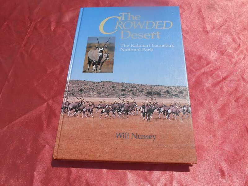 `The Crowded Desert`  The Kalahari Gemsbok Park.  Wilf Nussey.  Hard cover.