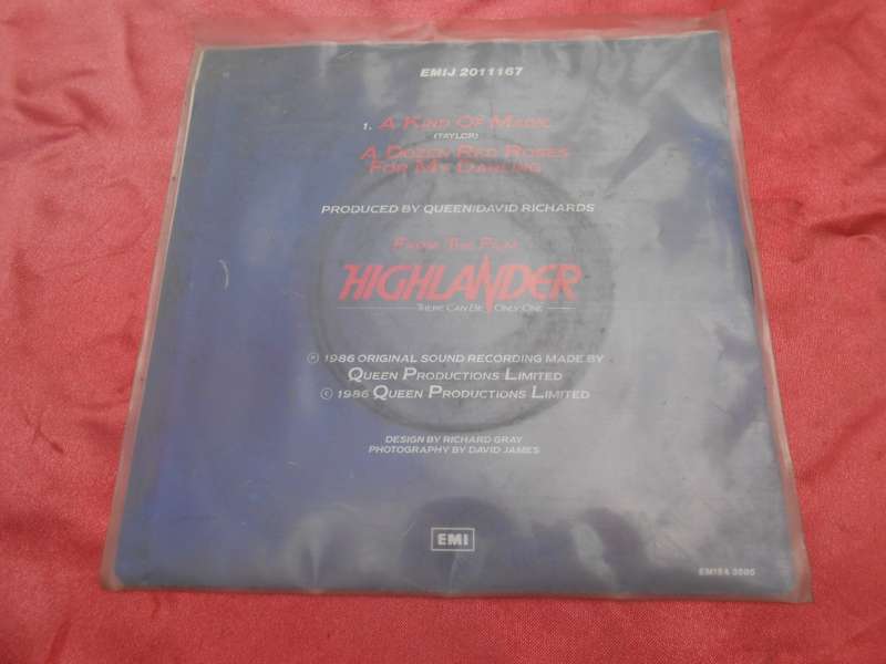 Vinyl 7` single. Queen  It`s a Kind of Magic.  A Dozen Red Roses for my Darling. VG+ VG+