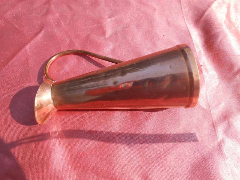 Small copper jug signed by Richard Mead.  Made in Rhodesia.  130mm high.