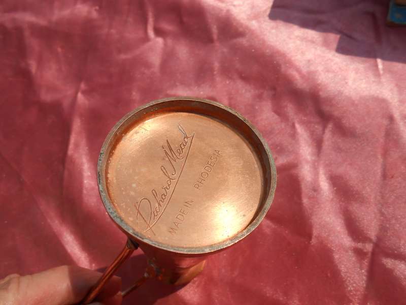 Small copper jug signed by Richard Mead.  Made in Rhodesia.  130mm high.