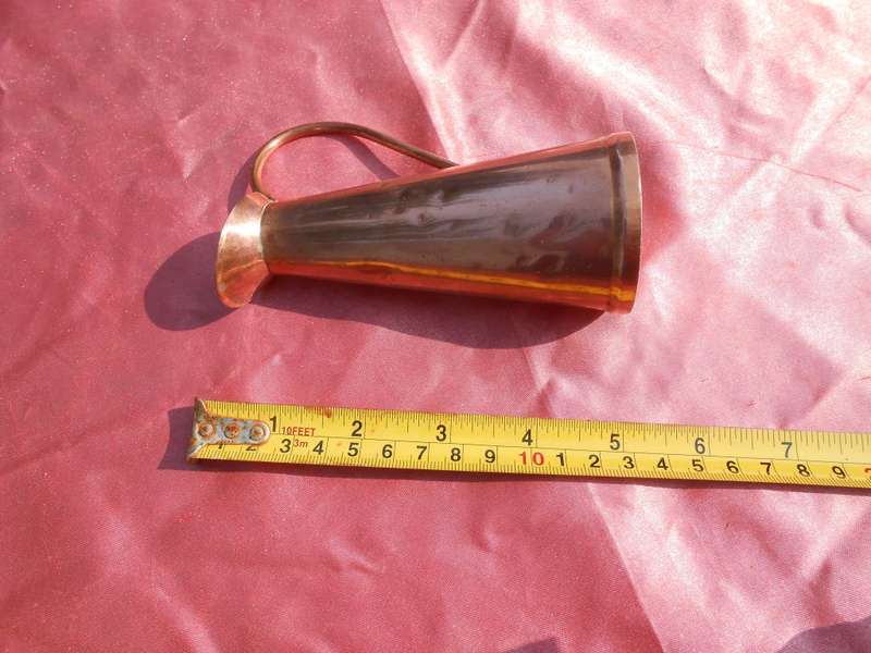Small copper jug signed by Richard Mead.  Made in Rhodesia.  130mm high.