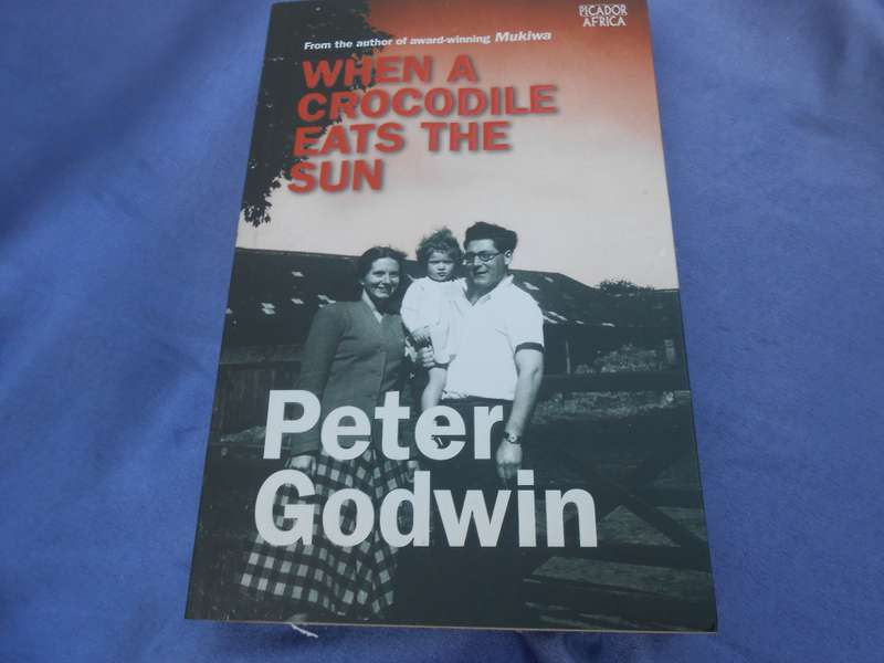 `When a Crocodile eats the Sun`  Peter Godwin.  Soft cover.