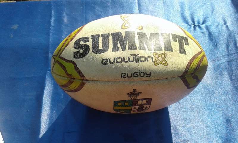 Rugby ball.  Summit Evolution. 320mm long.  Needs to be pumped.