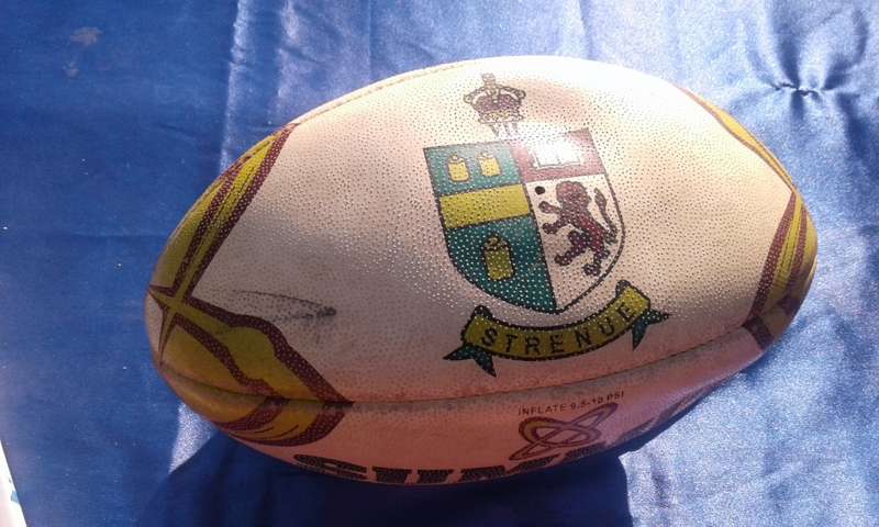 Rugby ball.  Summit Evolution. 320mm long.  Needs to be pumped.